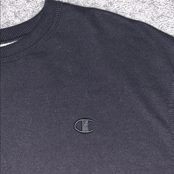 A black champion sweater. - Picture 2 of 4